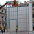 Assemblage d'une maison préfabriquée par Richard Rogers 